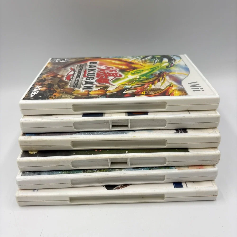 Nintendo Wii Games Bundle 6-Game Lot Various Good Bakugan Transformers Disney